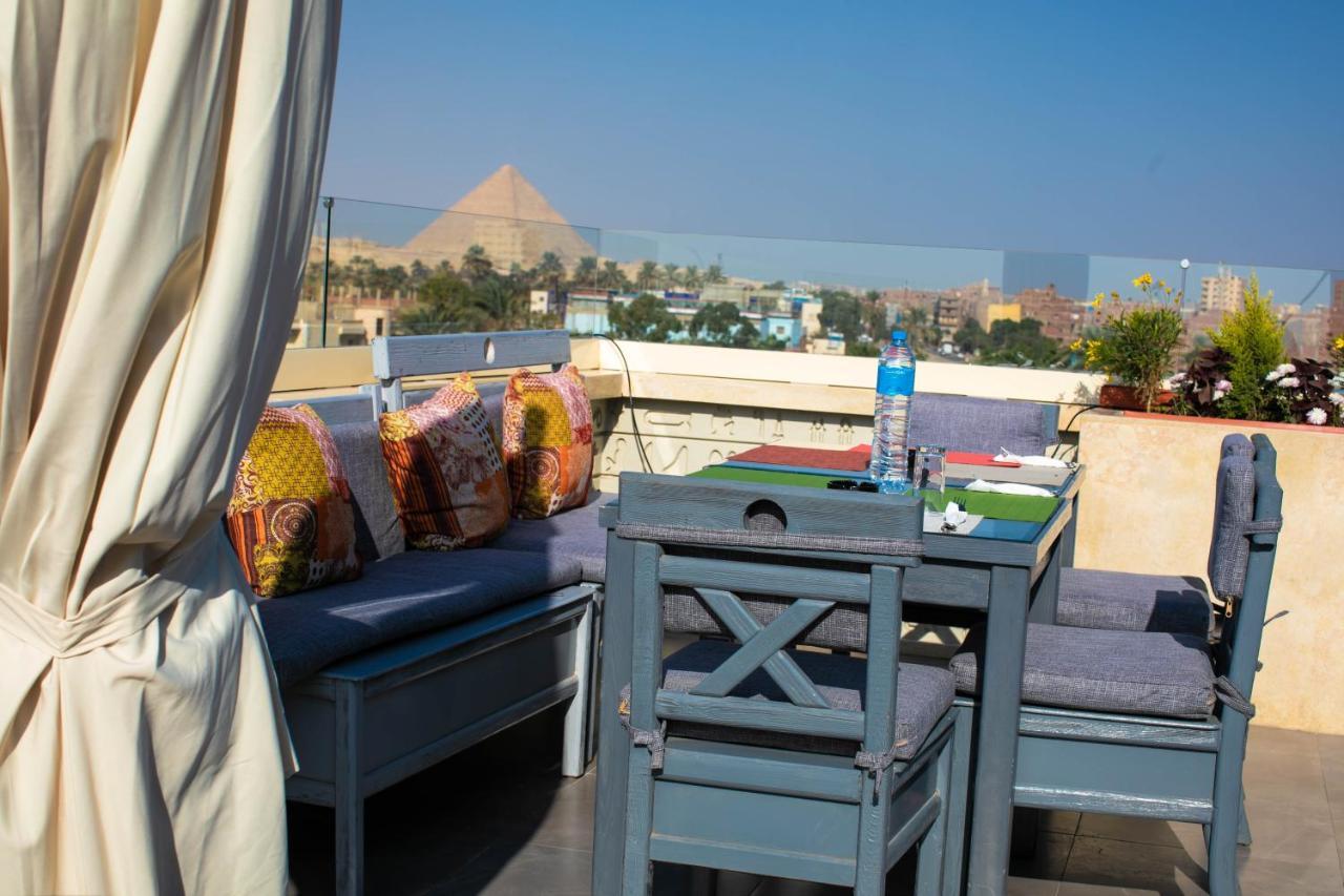 Pyramids Oasis Hotel Kafret el-Gabal Exterior foto