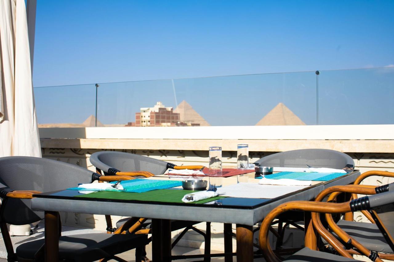 Pyramids Oasis Hotel Kafret el-Gabal Exterior foto